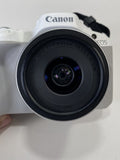 White Canon EOS R50 4K Video Mirrorless Camera with RF-S 18-45mm f/4.5-6.3