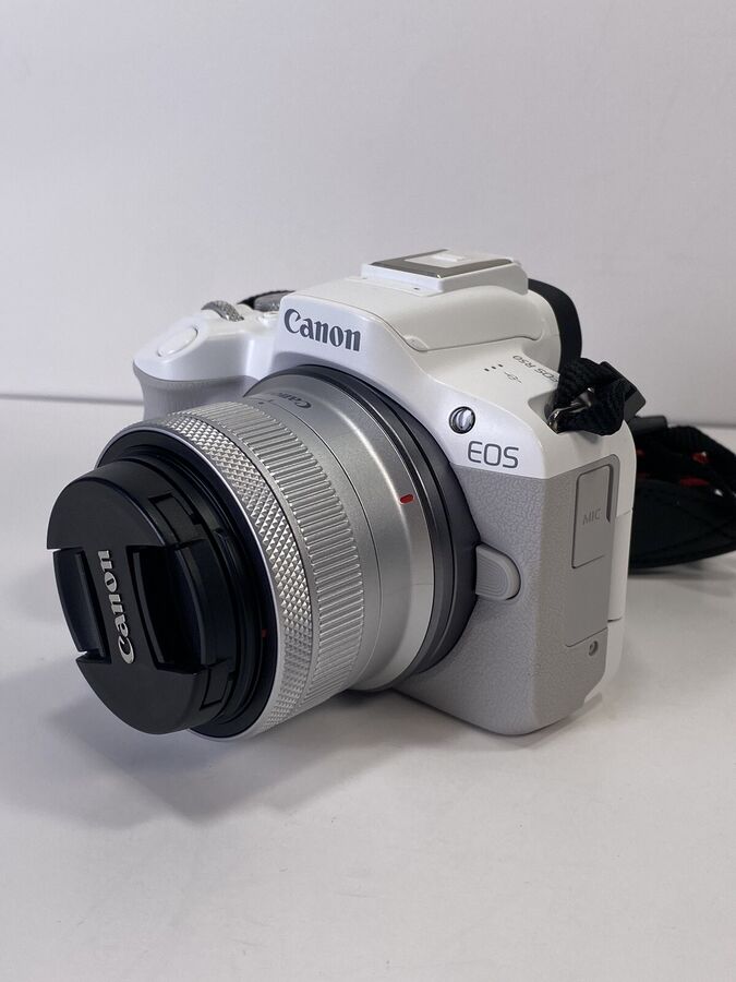 White Canon EOS R50 4K Video Mirrorless Camera with RF-S 18-45mm f/4.5-6.3